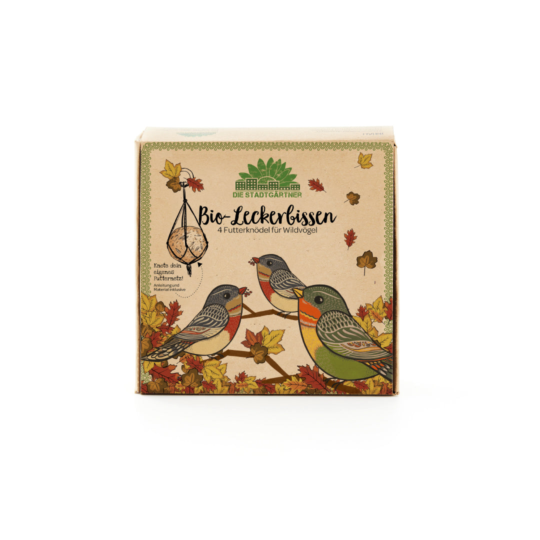 Verpackung von "Bio-Leckerbissen" Vogelfutter von Die Stadtgärtner mit illustrierten Wildvögeln und Herbstblättern.