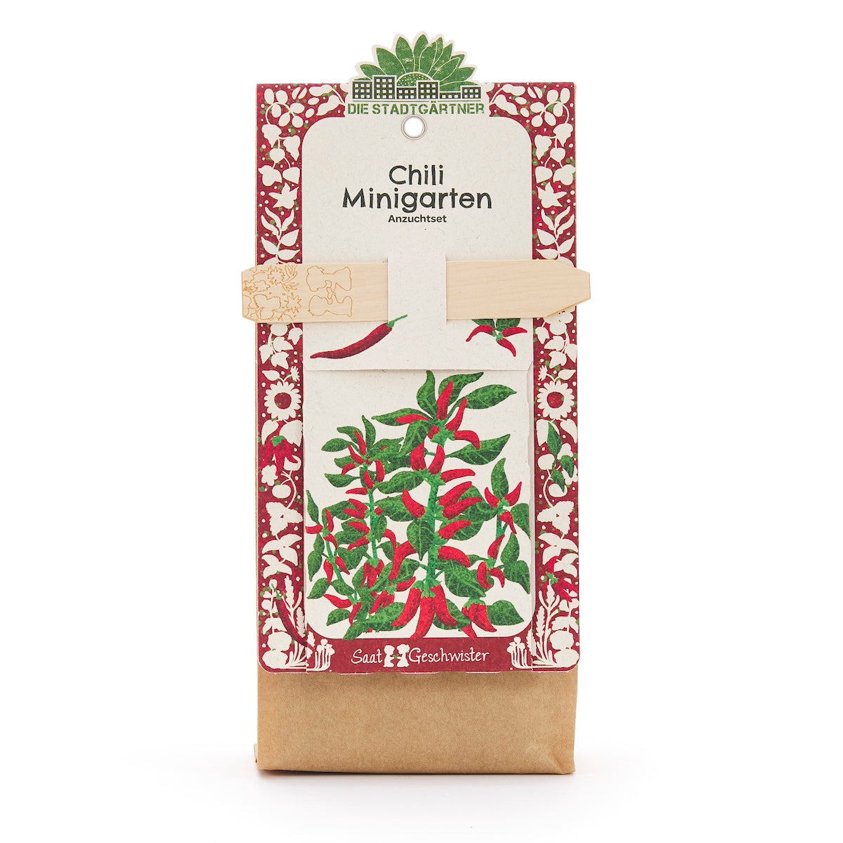 Chili Minigarten Anzuchtset von Die Stadtgärtner mit rotem und grünem Pflanzenmotiv auf der Verpackung.