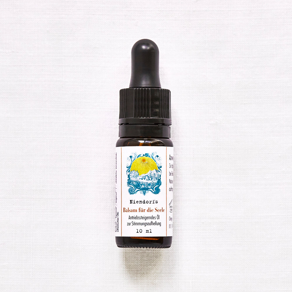 Flasche mit Pipette auf hellem Hintergrund, Etikett zeigt "Niendorfs Balsam für die Seele, Antistressöl zur Stimmungsaufhellung, 10 ml".